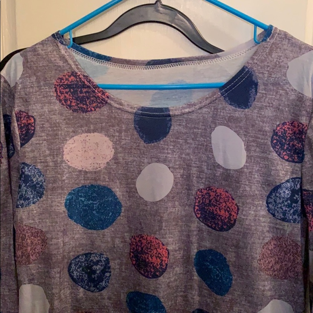 Large purple polkadot shirt